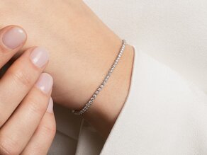 Tennisarmband in 18K witgoud met 74 diamanten 1,25ct G/SI, 16cm