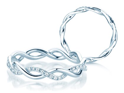 Verlovingsring Sparkling Curve in 14K witgoud met diamanten 0,14ct G/SI