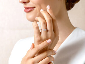 Verlovingsring Surprise in 9K witgoud met diamant 0,50ct H/SI