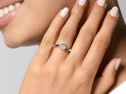 Verlovingsring Twist in 18K roségoud met diamant 0,40ct G/SI