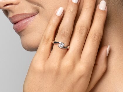 Verlovingsring Twist in platina 950/- met diamant 0,50ct G/SI