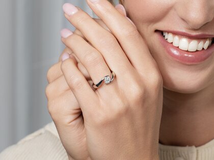 Verlovingsring Twist in platina 950/- met diamant 0,50ct G/SI