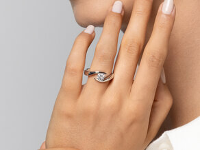 Verlovingsring Twist in 9K witgoud met diamant 0,75ct H/SI