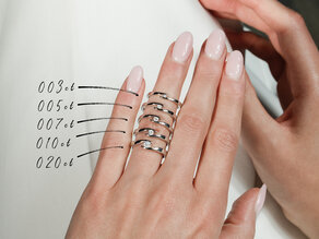 Verlovingsring Twist in 14K witgoud met diamant 0,05ct H/SI